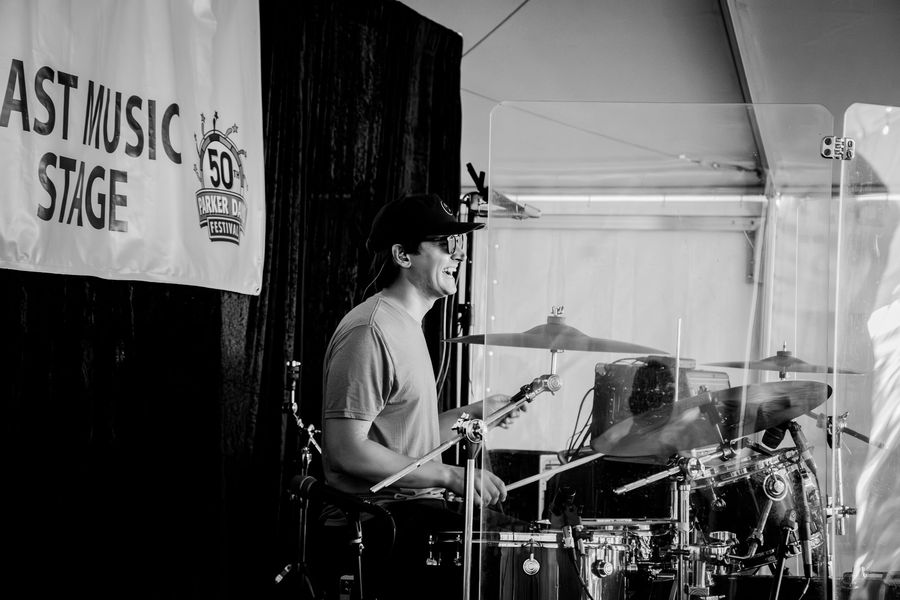 Little Moses Jones performing at a festival